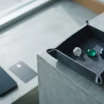 Polished gemstones on a slate jeweller